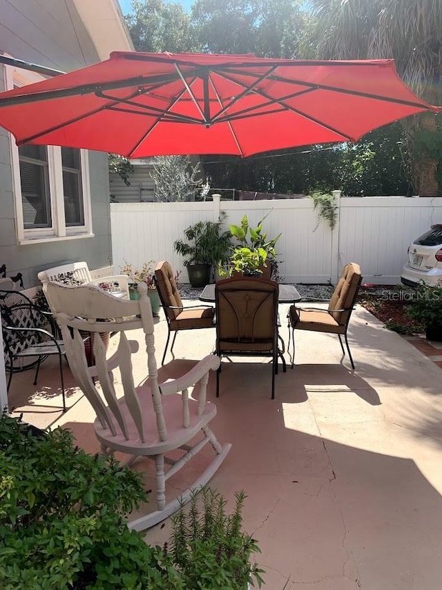 1919 W N A St, Tampa, FL 33606 - view of patio / terrace featuring fence and outdoor dining area