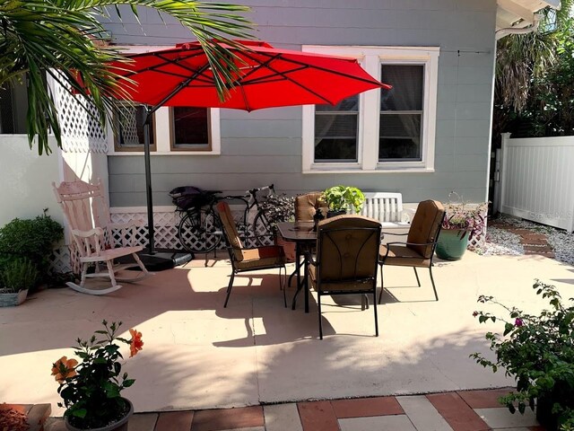 1919 W N A St, Tampa, FL 33606 - view of patio with outdoor dining area and fence