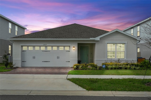 view of front of house with a garage