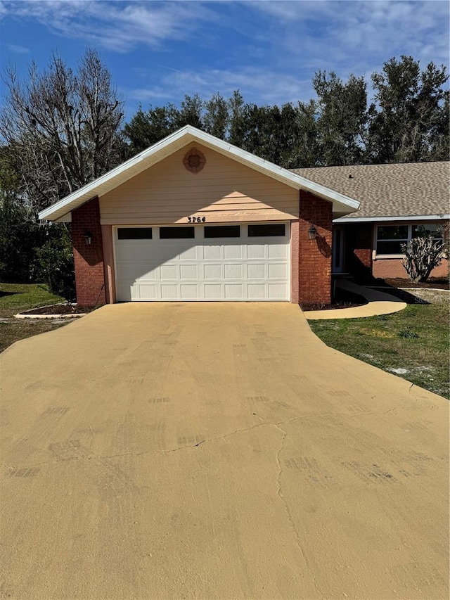 single story home with a garage