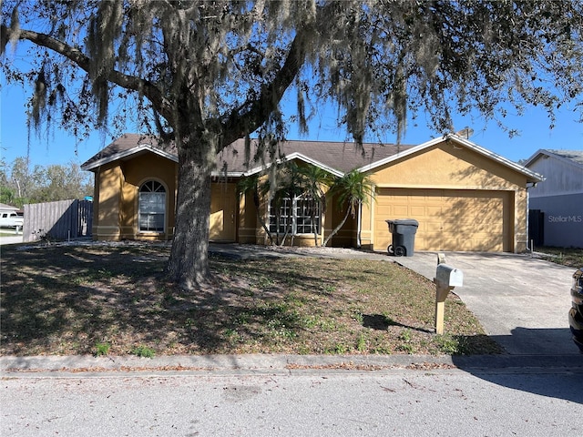 ranch-style home with a garage