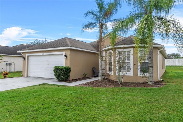 view of front of house featuring an attached garage, driveway, roof with shingles, stucco siding, and a front yard