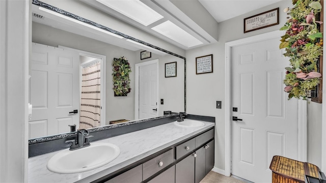 bathroom featuring vanity and tile patterned floors