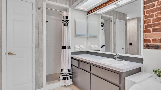 bathroom with vanity and curtained shower