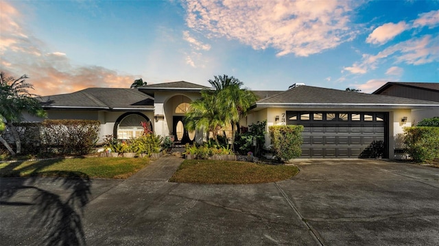 view of front of property featuring a garage