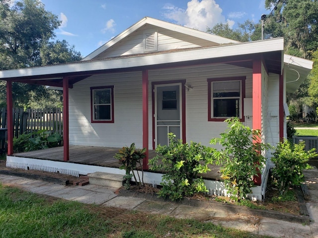 bungalow featuring cooling unit and covered porch