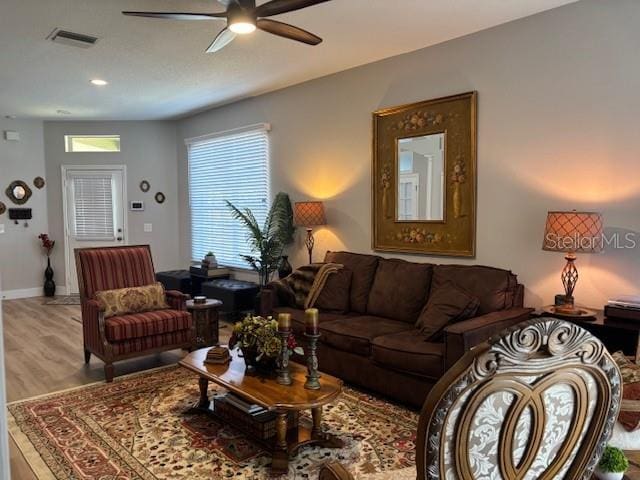 8623 Snowy Owl Way, Tampa, FL 33647 - living room with visible vents, baseboards, ceiling fan, recessed lighting, and wood finished floors