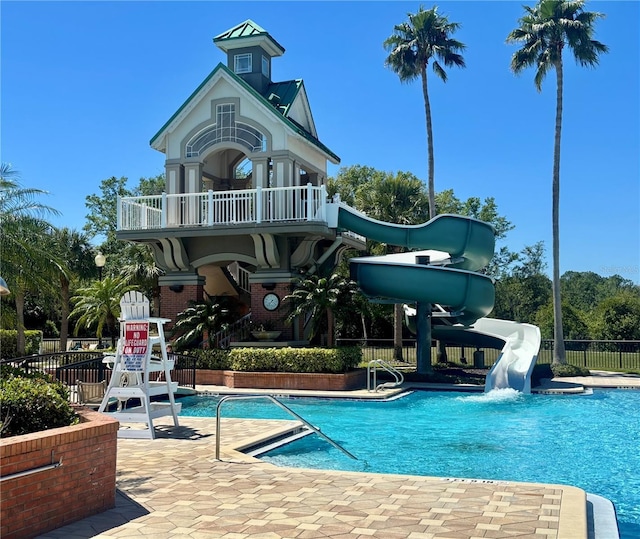 8623 Snowy Owl Way, Tampa, FL 33647 - exterior space featuring fence, a community pool, and a balcony