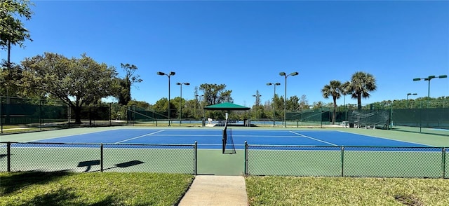 8623 Snowy Owl Way, Tampa, FL 33647 - view of sport court featuring community basketball court and fence