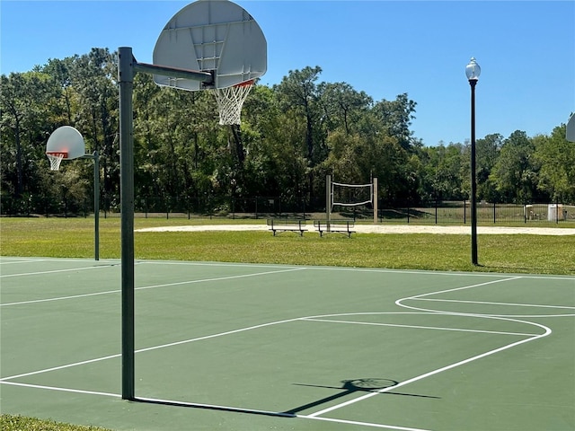 8623 Snowy Owl Way, Tampa, FL 33647 - view of basketball court featuring community basketball court and a lawn