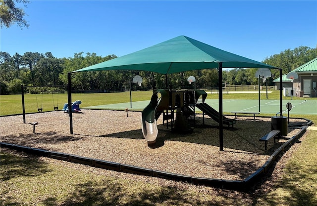 8623 Snowy Owl Way, Tampa, FL 33647 - community jungle gym featuring community basketball court and a yard