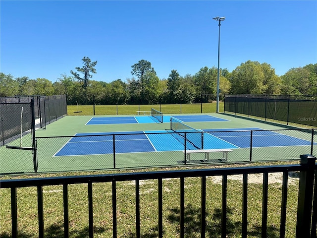 8623 Snowy Owl Way, Tampa, FL 33647 - view of sport court with community basketball court and fence