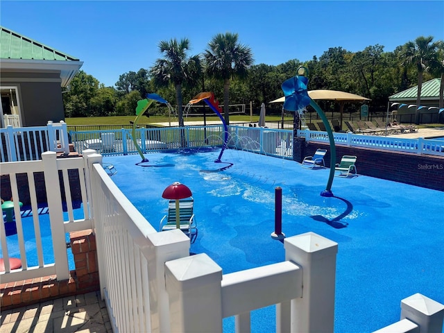 8623 Snowy Owl Way, Tampa, FL 33647 - view of pool featuring fence and playground community