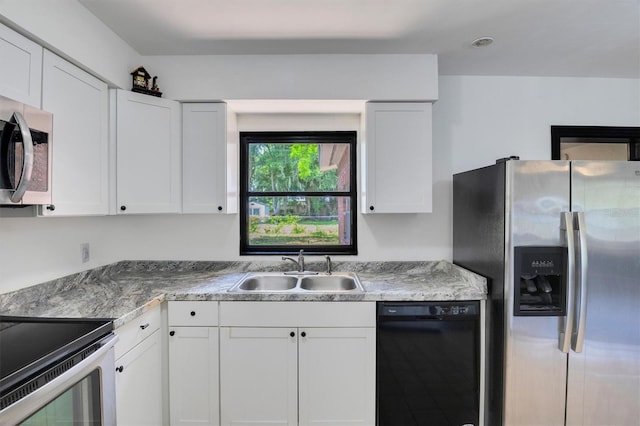 kitchen featuring white cabinetry, sink, and stainless steel appliances