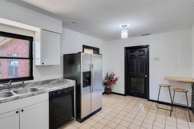 kitchen with stainless steel fridge with ice dispenser, white cabinets, sink, and black dishwasher