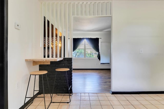 interior space featuring tile patterned flooring