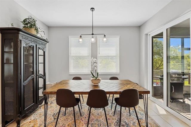 dining room with light tile patterned flooring