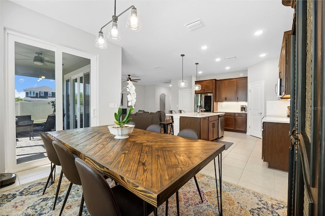 dining space featuring light tile patterned floors, recessed lighting, visible vents, and ceiling fan