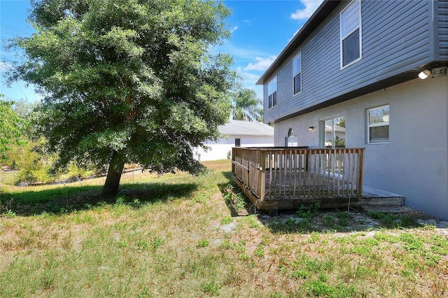 view of yard with a deck