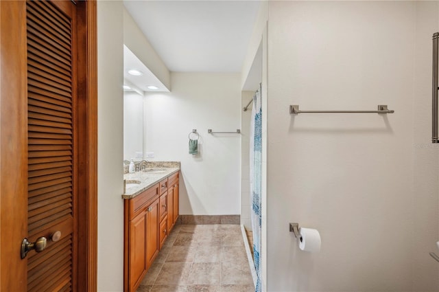 bathroom featuring vanity and tile patterned flooring