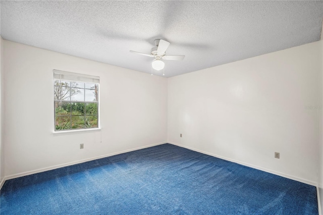 unfurnished room featuring ceiling fan, carpet, and a textured ceiling