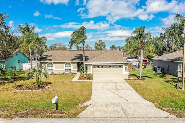 ranch-style house with a front yard and a garage