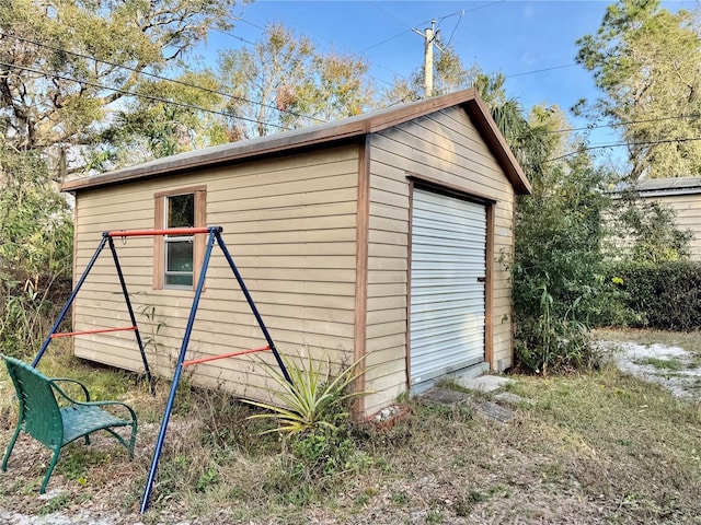 view of outdoor structure with a garage