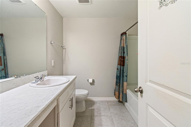 bathroom with toilet, shower / bath combo, vanity, tile patterned flooring, and baseboards