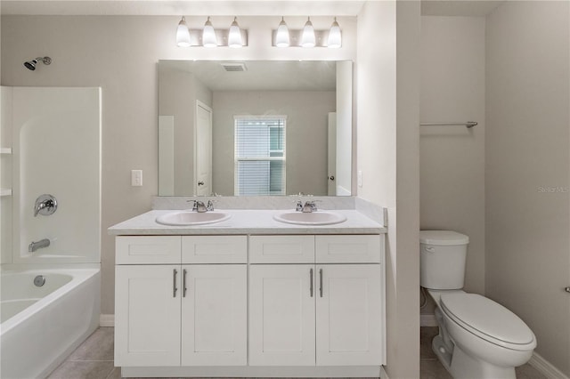 bathroom with visible vents, a sink, toilet, and tile patterned floors