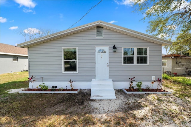 view of front of home with a front yard