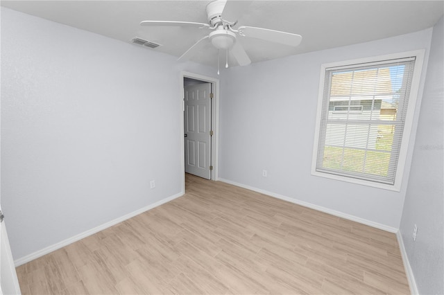 unfurnished room featuring ceiling fan and light hardwood / wood-style flooring