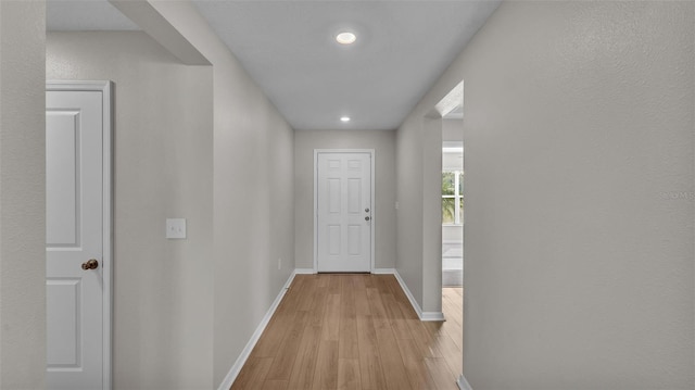 hallway featuring light hardwood / wood-style flooring