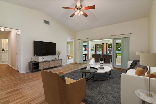 3976 Cypress Lndg W, Winter Haven, FL 33884 - living room with light wood-type flooring, ceiling fan, pool table, and high vaulted ceiling