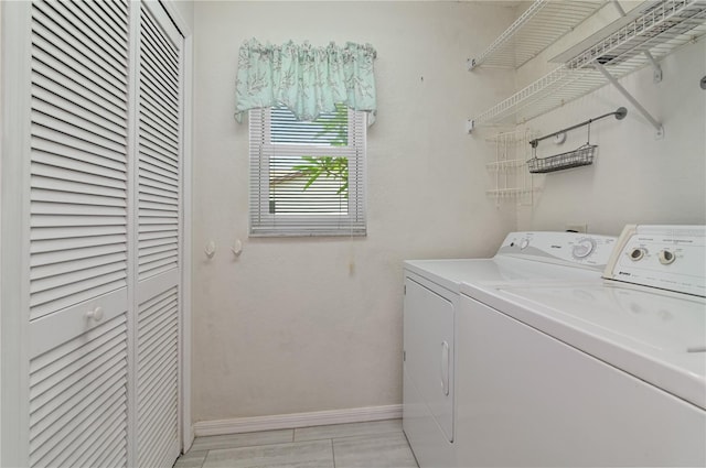 3976 Cypress Lndg W, Winter Haven, FL 33884 - laundry room featuring independent washer and dryer and baseboards