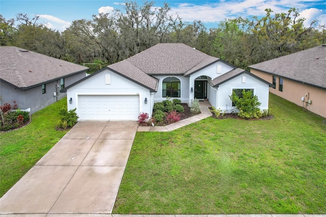 ranch-style home with driveway, an attached garage, roof with shingles, and a front yard