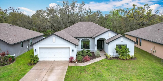 153 Heritage Park Ln, Mulberry, FL 33860 - view of front of house featuring an attached garage, driveway, a front lawn, and stucco siding