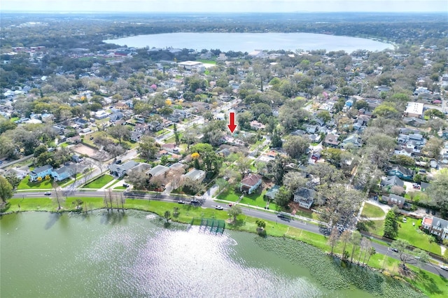 birds eye view of property with a residential view and a water view