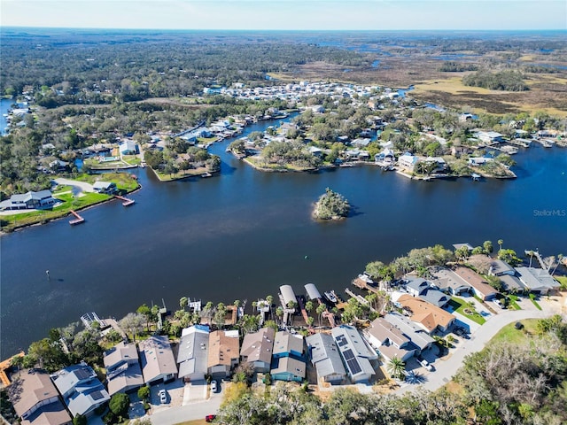 aerial view with a residential view and a water view