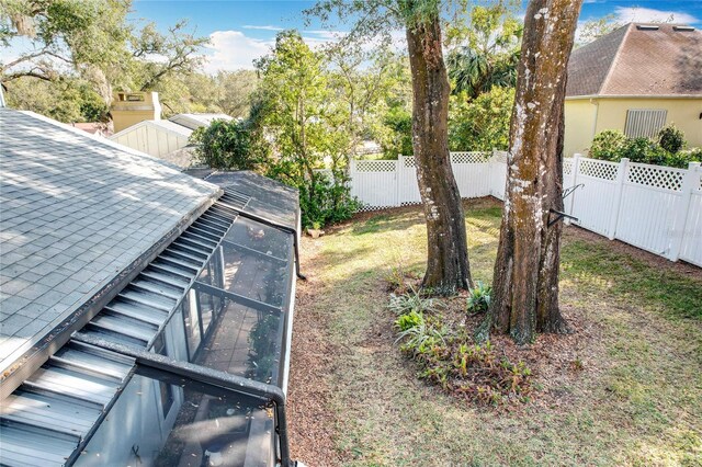 details featuring a fenced backyard