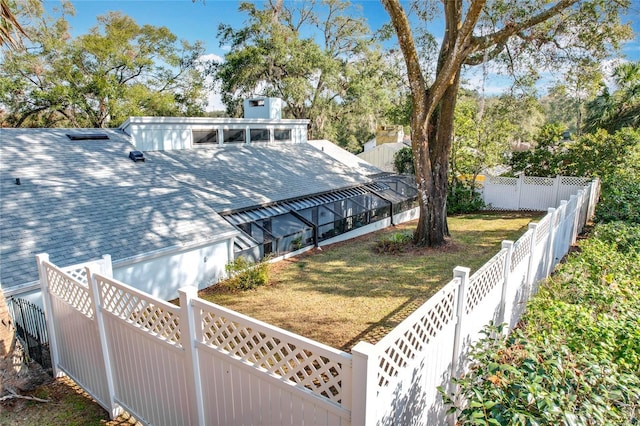 view of yard featuring a fenced backyard