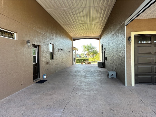 394 Nolane Ln, Polk City, FL 33868 - view of patio / terrace with a garage