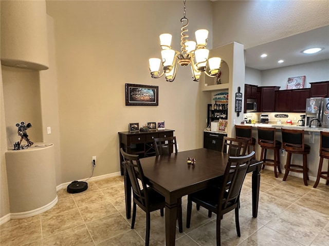 394 Nolane Ln, Polk City, FL 33868 - dining space with an inviting chandelier, light tile patterned floors, baseboards, and recessed lighting