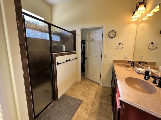 394 Nolane Ln, Polk City, FL 33868 - full bathroom featuring double vanity, a stall shower, and a sink