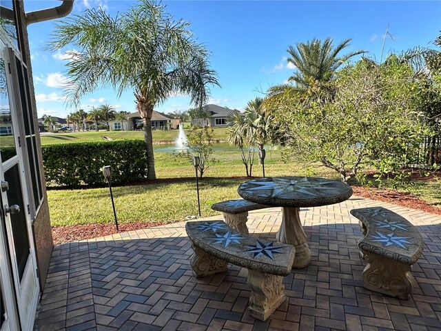 394 Nolane Ln, Polk City, FL 33868 - view of patio featuring a water view