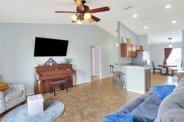 living room with ceiling fan, recessed lighting, visible vents, baseboards, and vaulted ceiling