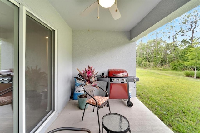 view of patio / terrace featuring grilling area and a ceiling fan