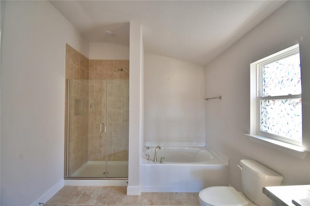 full bathroom with toilet, vanity, a bath, tile patterned floors, and a stall shower