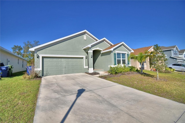 single story home featuring a garage, a front yard, concrete driveway, and stucco siding