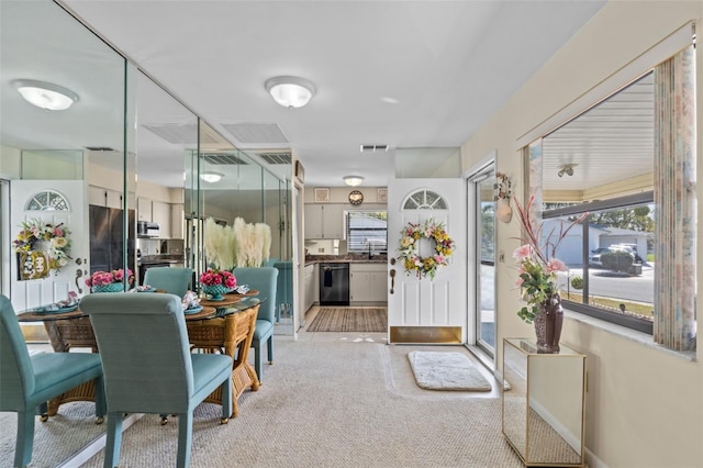 dining room featuring visible vents