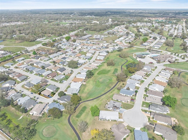 birds eye view of property with a residential view and view of golf course